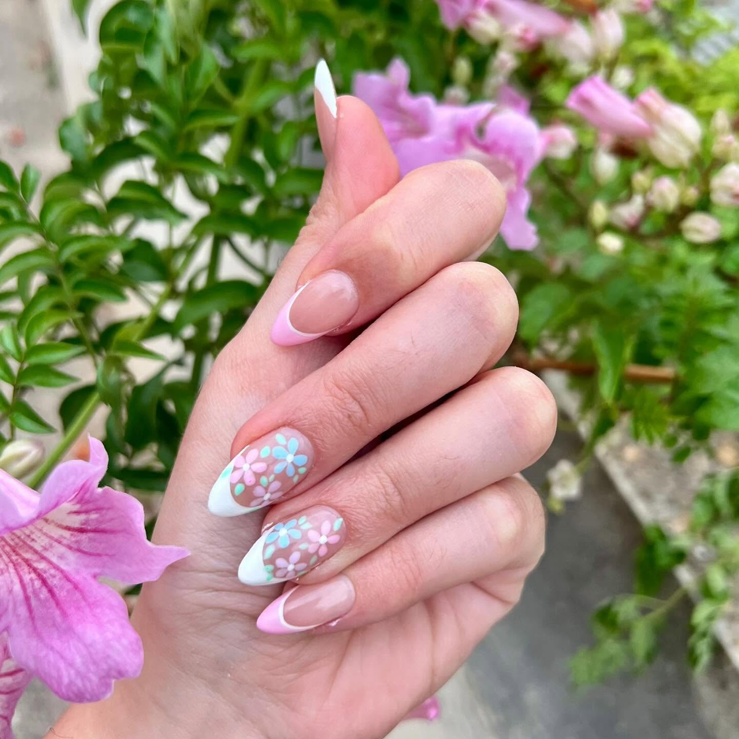 Pink French Manicure with Pastel Floral Design