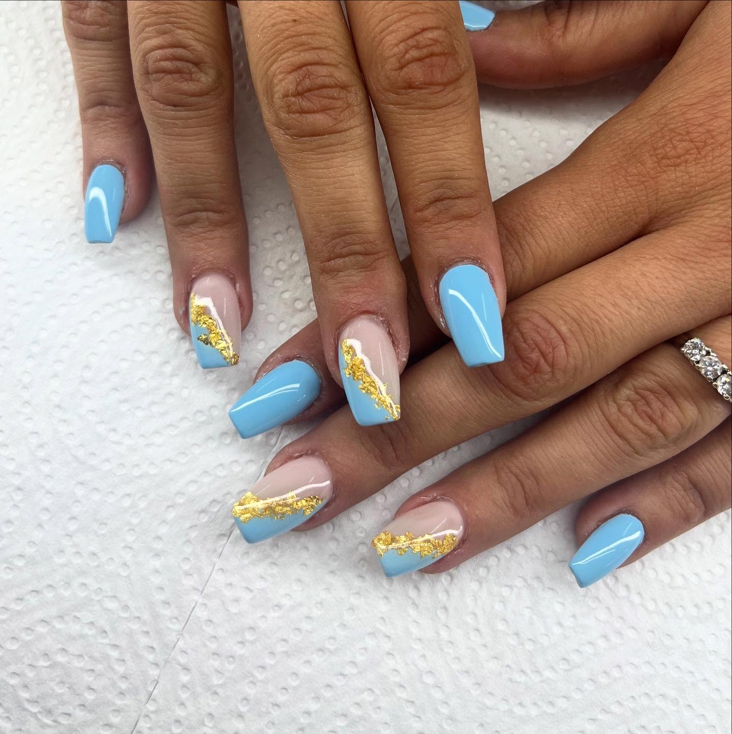 Sky Blue Nails with Marble Texture and Gold Leaf Foil