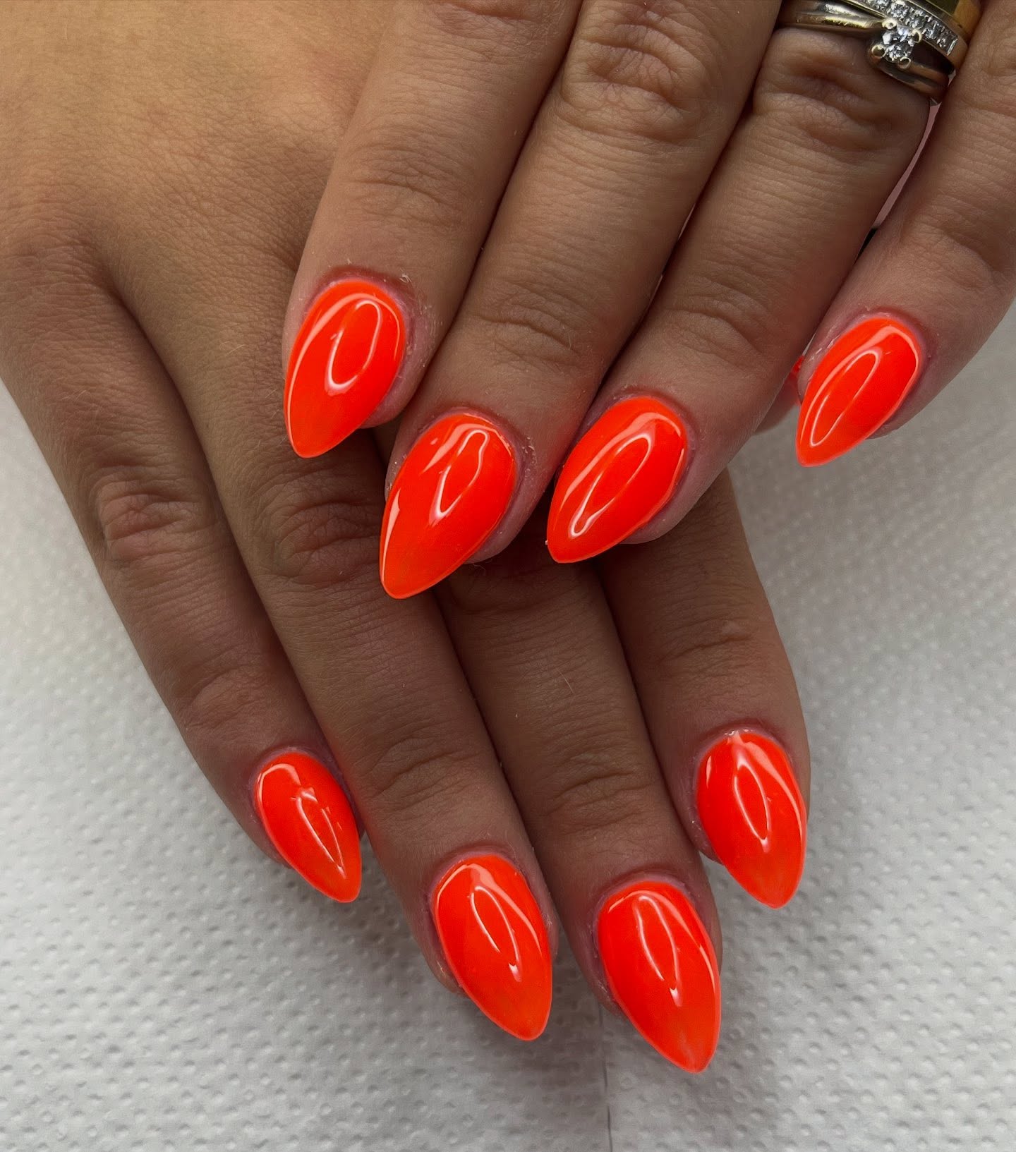 Vibrant Neon Orange Almond Shaped Gel Nails